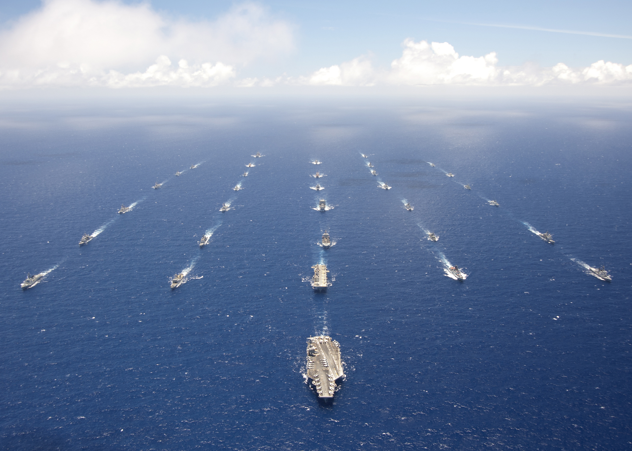 120727-N-VD564-015PACIFIC OCEAN (July 27, 2012)Ships and submarines participating in Rim of the Pacific (RIMPAC) exercise 2012 sail in formation in the waters around the Hawaiian islands. Twenty-two nations, more than 40 ships and submarines, more than 200 aircraft and 25,000 personnel are participating in the biennial Rim of the Pacific (RIMPAC) exercise from June 29 to Aug. 3, in and around the Hawaiian Islands. The world's largest international maritime exercise, RIMPAC provides a unique training opportunity that helps participants foster and sustain the cooperative relationships that are critical to ensuring the safety of sea lanes and security on the world's oceans. RIMPAC 2012 is the 23rd exercise in the series that began in 1971. (U.S. Navy photo by Chief Mass Communication Specialist Keith Devinney/RELEASED)