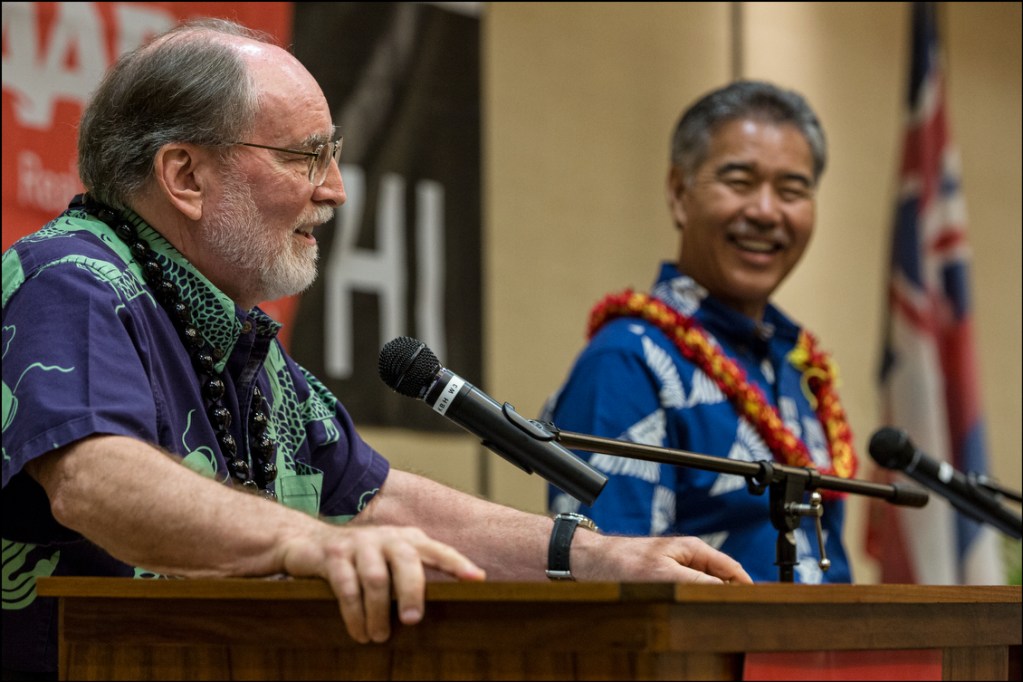 Gov. Neil Abercrombie and Sen. David Ige share a lighter moment during debate presented by AARP at the King Kamehameha Hotel in Kailua-Kona on July 29, 2014