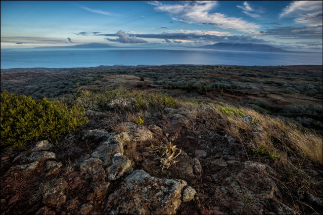 Lanai, Molokai and Maui are seen from Navigator's Seat on Kahoolawe. 9.28.14
