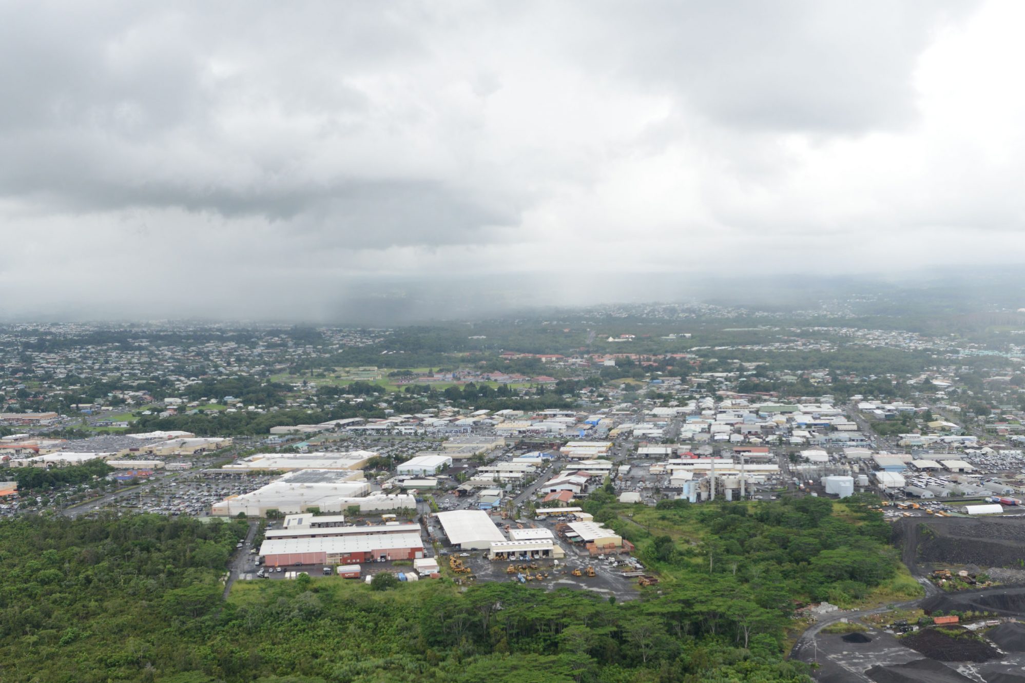 View looking north from the airport as helicopter was flying east out of the airport. Industrial area of Hilo, Hawaii near Airport. Hilo, Hawaii. 29 october 2014. photograph Cory Lum