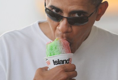President Barack Obama enjoys 'Snowbama' shave ice (CQ) at Island Snow hawaii located in Kailua, hawaii. January 1, 2010. photo Cory Lum