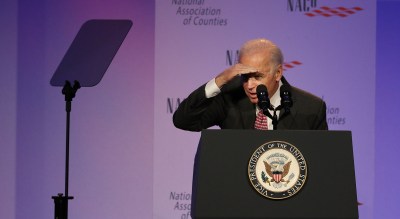 VIce President Joe Biden gestures to look for his city council person in the audience. 23 feb 2015. photograph Cory Lum/Civil Beat
