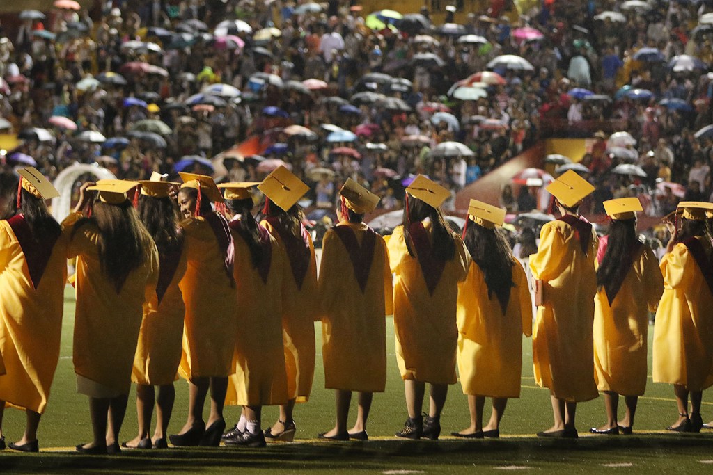 Roosevelt seniors line up before commencemtn ceremony. 30 may 2015. photograph Cory Lum/Civil Beat