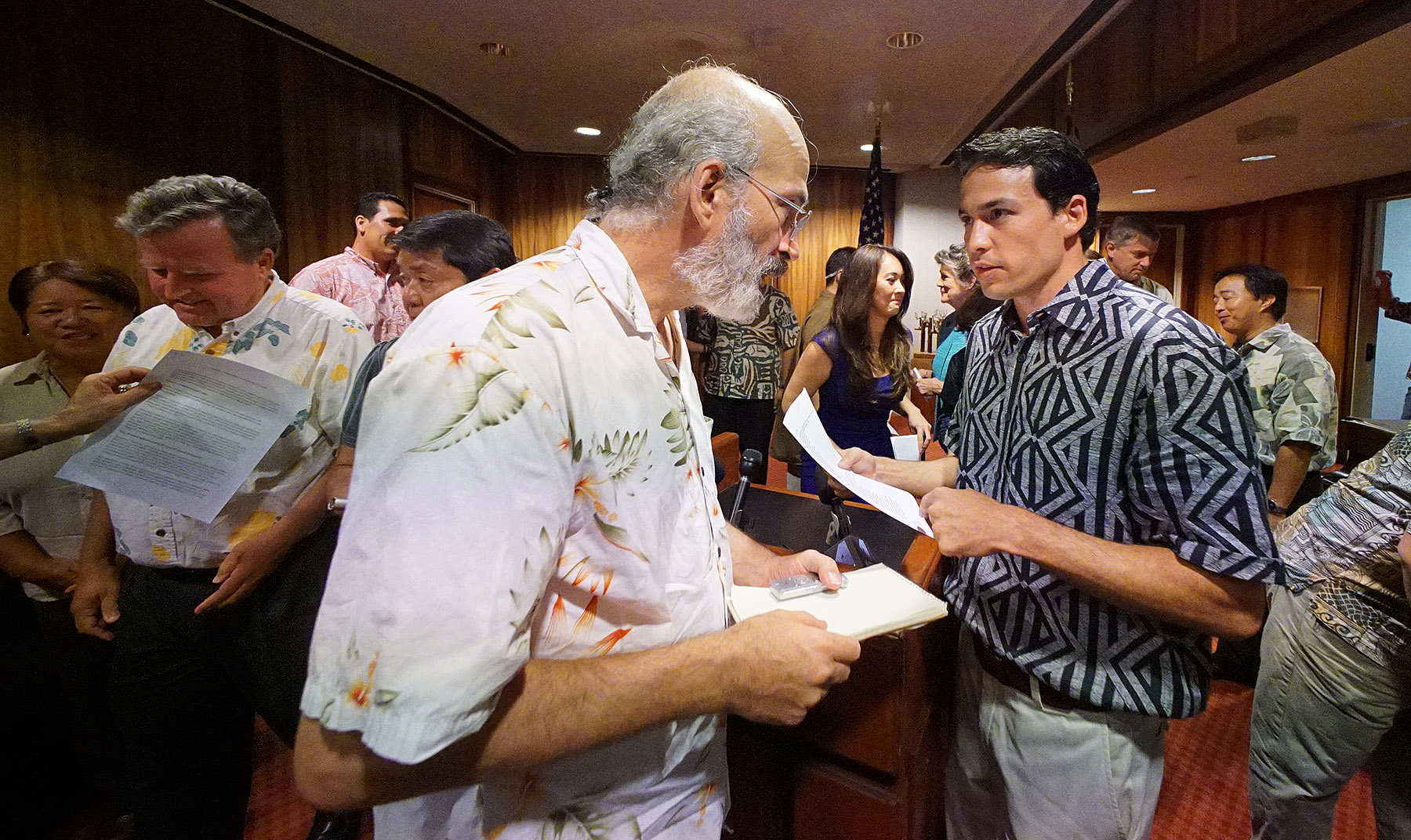 Blogger Henry Curtis guestions Rep Chris Lee after public officials from all islands made statements on the future of electric utilities in Hawaii at press conference held at the Capitol. 3 sept 2015. photograph Cory Lum/Civil Beat