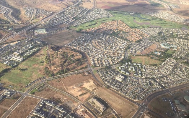 Kapolei. Makakilo Gulch center bottom. Kapolei Golf course at right of photo. Villages of Kapolei Recreation Center, right side of photo.