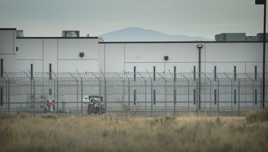 Saguaro Correctional Facility. People walking around inside of fences. Eloy, Arizona 6 march 2016. photograph Cory Lum/Civil Beat