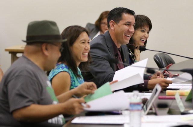 Senator Kaialii Kahele in light moment during conference committee with Sen. Shimabukuro, Sen Mercado Kim and left Sen. Keith Agaran. 215 agenda. 26 april 2016.
