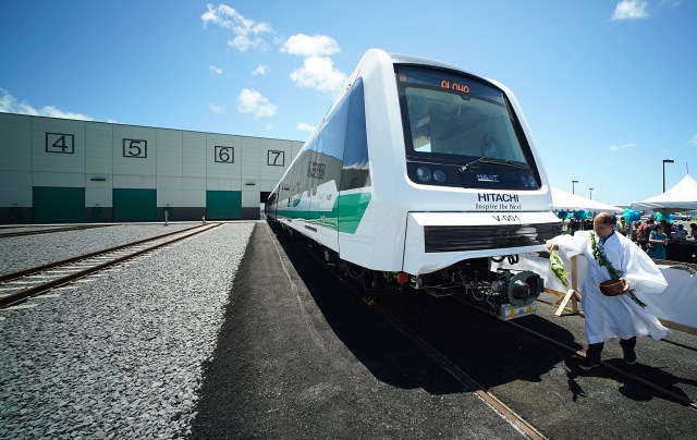 Kahu Cordell Kekoa blesses HART Train No.1 after unveiling ceremonies. 2 may 2016.
