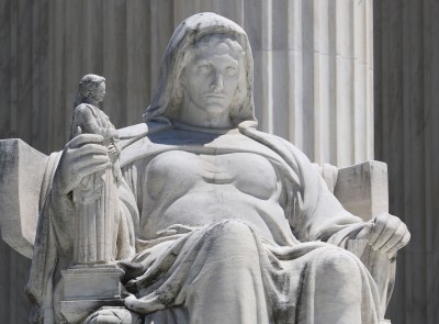 Supreme Court Justices Skeptical About Hawaii’s Challenge to Trump Travel Ban