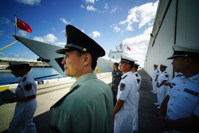 Officers from the People Liberation Army Navy fronting Chinese navy ship Xian at Pearl Harbor during a day open to media. The Xian is one of 3 ships participating in RIMPAC. 2016 july 8