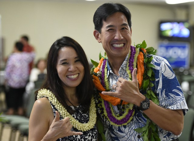 Charles Djou stands with his wife Stacey flashes the Hawaiian 'Shaka' sign at the Pearl Country Club in Pearl City, HI, on Saturday, August 13, 2016.(Civil Beat photo by Ronen Zilberman)