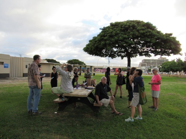 A group of community members await the start of the Oct. 16 "Papers in the Park" walking tour at Mother Waldron Park. 