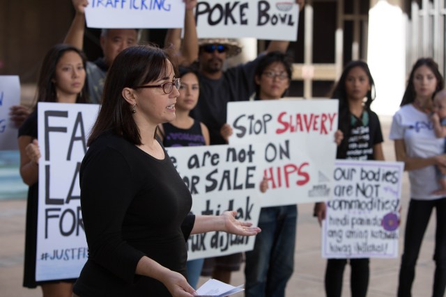 Marti Townsend, head of the Sierra Club's Hawaii Chapter, speaks during a rally against alleged labor abuses of foreign crew aboard U.S. fishing boats.