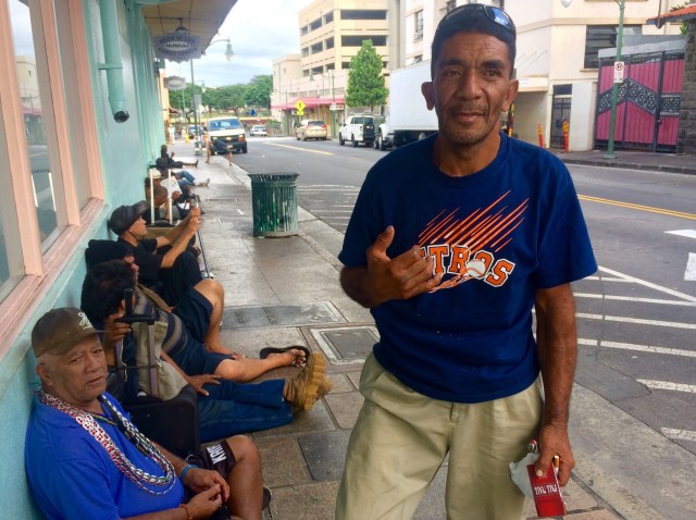 Happy Iokia lines up with others along Pauahi Street for waiting for free breakfast from River of Life. 17 Nov 2016