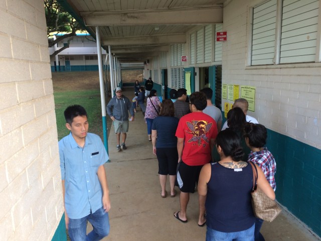 There was a line out the door before 8 a.m. at William P. Jarrett Middle School in the Palolo Valley.