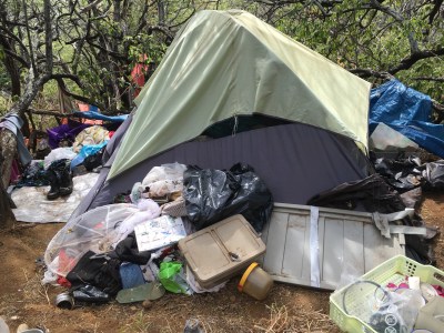 Another trash-strewn encampment on Diamond Head.