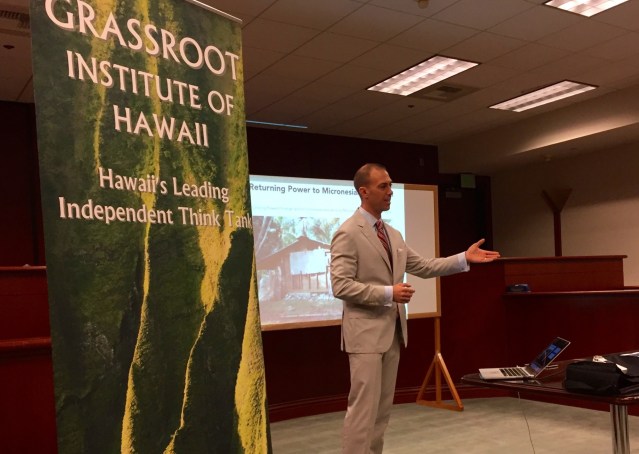 Neil Mellen shared his views on America's role in Micronesia downtown Thursday.
