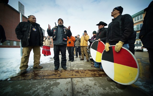 Hawaii activist and Standing Rock supporter Andre Perez introduces Standing Rock Sioux speaker outside the Mandan Police Station. 2 dec 2016