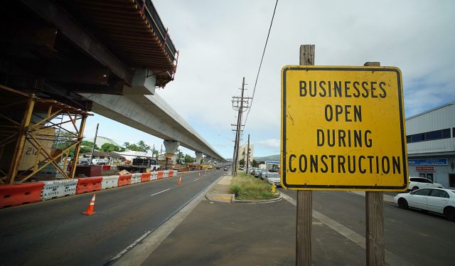 Sign reads ‘Businesses still open’ on the mauka side of Farrington Highway in Waipahu near Jack in the Box.