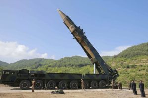 FILE - In this July 4, 2017, file photo distributed by the North Korean government, North Korean leader Kim Jong Un, second from right, inspects the preparation of the launch of a Hwasong-14 intercontinental ballistic missile (ICBM) in North Korea's northwest. Hawaii is the first state to prepare the public for the possibility of a ballistic missile threat from North Korea. The state's Emergency Management Agency on Friday, July 21, 2017 announced a public education campaign. Agency Administrator Vern Miyagi says because it would take a missile about 15 minutes to arrive, there won't be much time to prepare. He says that's why instructions are simple: "Get inside, stay inside and stay tuned."  (Korean Central News Agency/Korea News Service via AP, File)