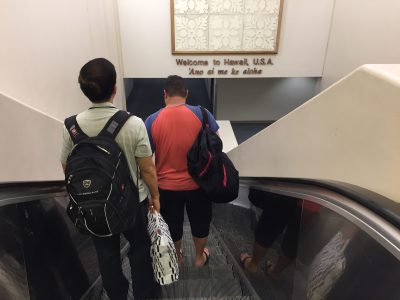Daniel Inouye Airport escalator to immigration area.