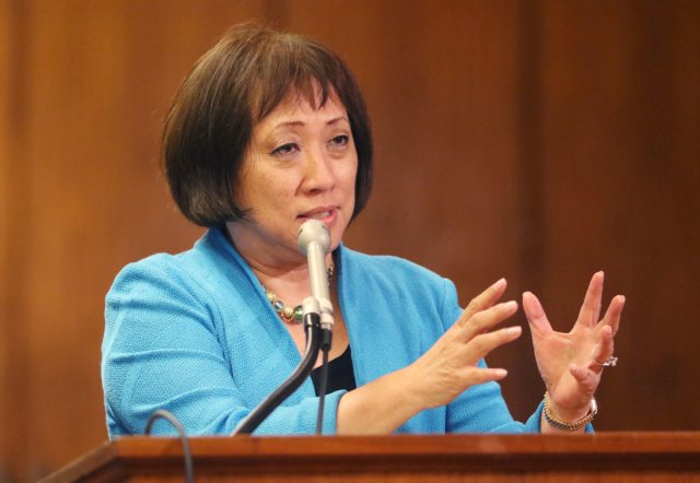 Congresswoman Colleen Hanabusa answers questions from senators in rail meeting.