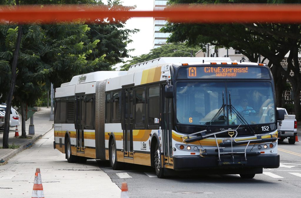 Articulated TheBus Bus along Beretania Street.