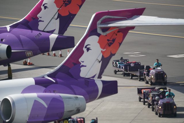 Hawaiian Airlines jet at Daniel Inouye International Airport. Honolulu, Hawaii.
