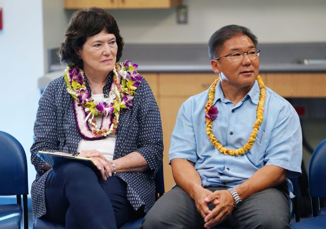 Public sit in a circle during a meet/greet with Board of Education board member Dwight Takeno and left, Chair Catherine Payne at Manoa Library.