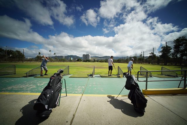 Golfers enjoy hitting some balls at the Ala Wai Driving Range.