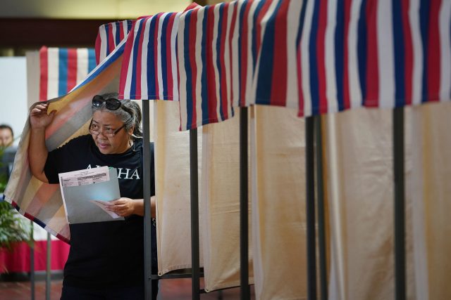 Person leaves booth at Early Voting 2018 Honolulu Hale. 4 aug 2018