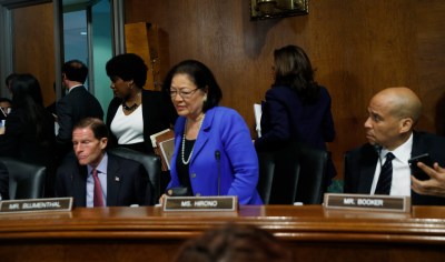 Democratic Senators stand to walk out of a Senate Judiciary Committee meeting, Friday, Sept. 28, 2018 on Capitol Hill in Washington (AP Photo/Pablo Martinez Monsivais)
