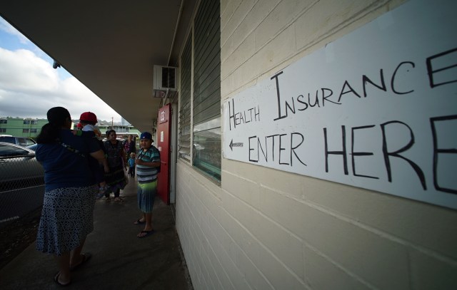 People overflow outside the We Are Oceania offices. Anita's story on health benefits deadline for COFA residents.