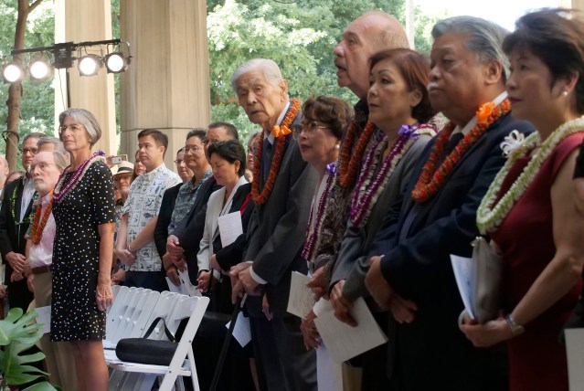 On far left, former Governors Neil Abercrombie and Linda Lingle look on while former Gov. George Ariyoshi and wife Jean Ariyoshi, former Gov. John Waihee and wife Lynne Waihee, and former Gov. Ben Cayetano and wife Vicky Cayetano also look on during the inauguration ceremony of current Gov. David Ige at the state capitol in Honolulu, HI, Monday, December 3, 2018. (Civil Beat photo Ronen Zilberman)