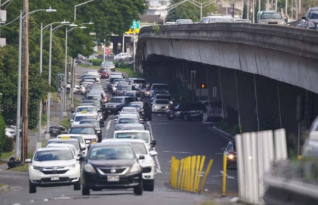 Lunalilo and Piikoi Street looking Diamond Head Direction as cars merge on the westbound onramp.