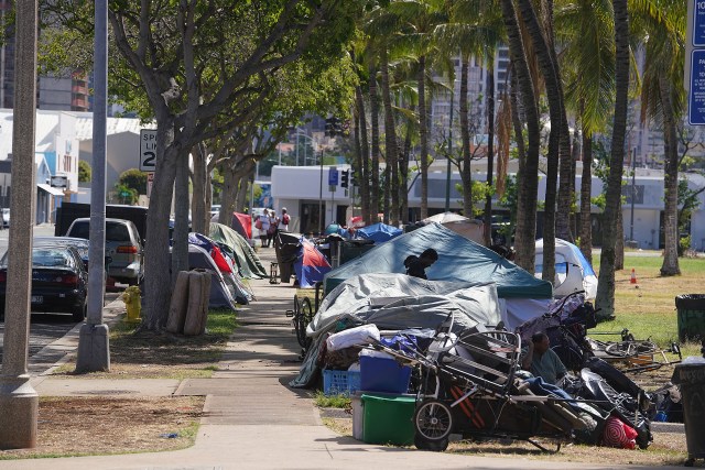 Homeless Encampment at Kakaako Gateway Park with tents.
