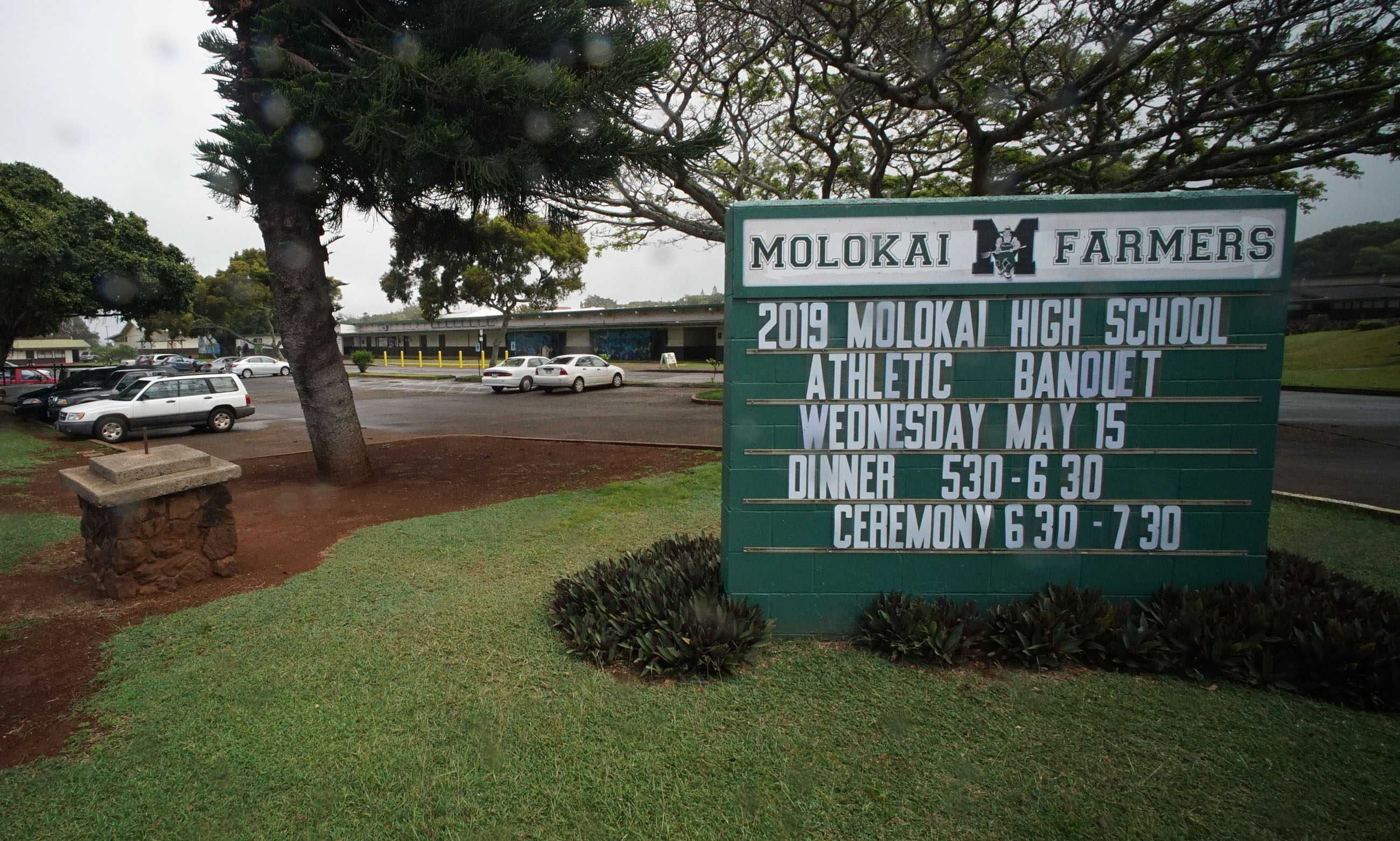 Molokai High School sign.