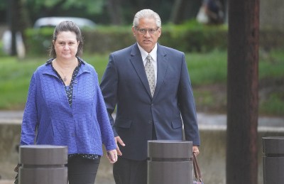 Former HPD Chief Louis Kealoha and Katherine Kealoha arrive at District Court.
