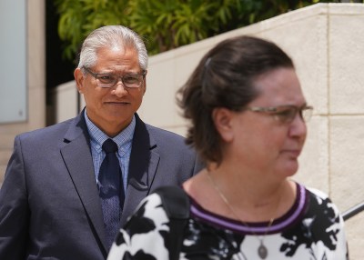 Former HPD Chief Louis Kealoha and Katherine Kealoha leave District Court during lunch recess.