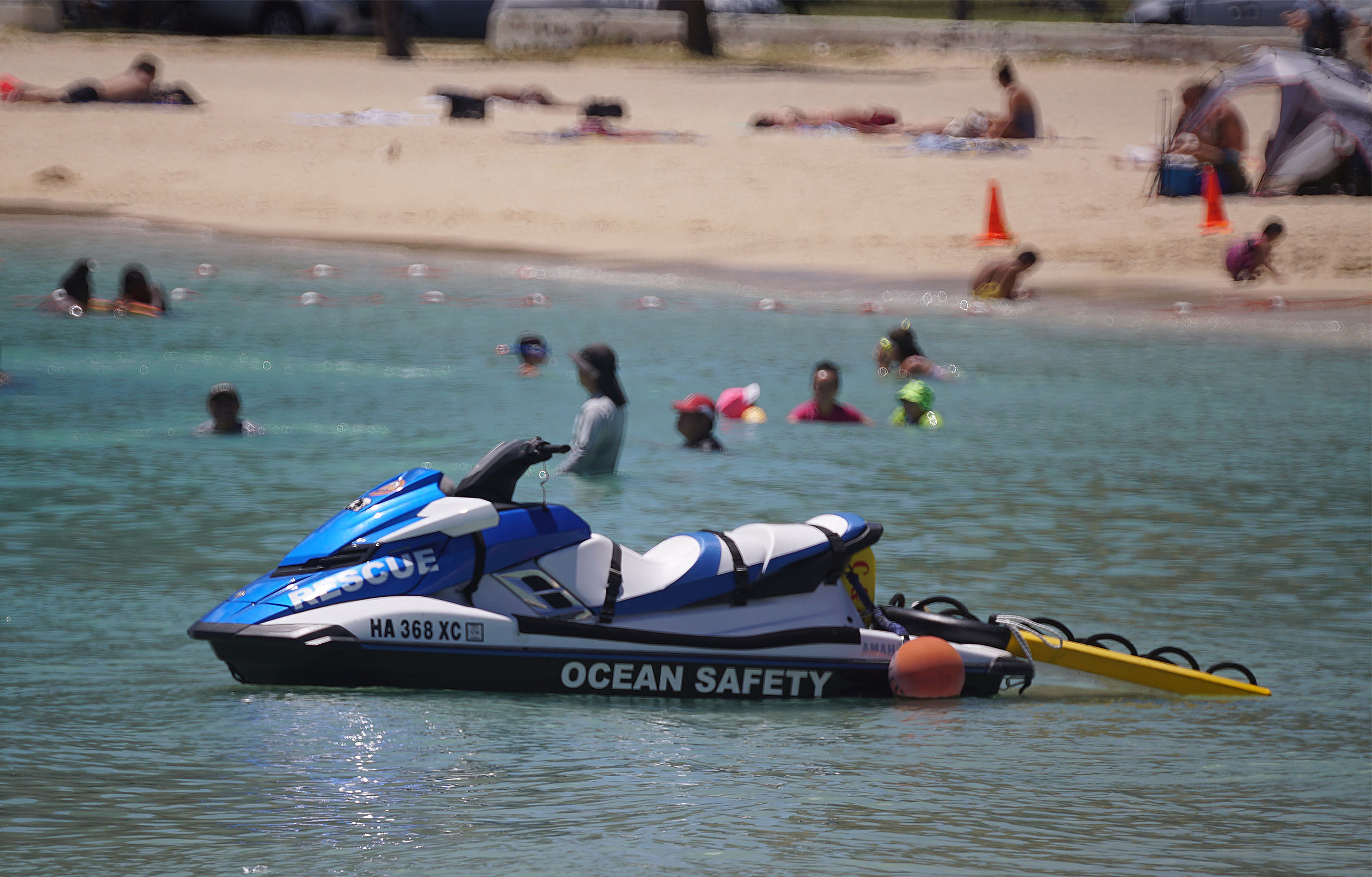 Ocean Safety Jet Ski sits near shore at Ala Moana Beach Park.