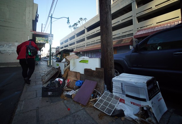 Trash along Maunakea Street on the Beretania end of Maunakea street.
