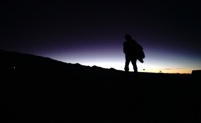 5am Before Sunrise near the Maunakea Access Road as demonstrators move around in the dark.