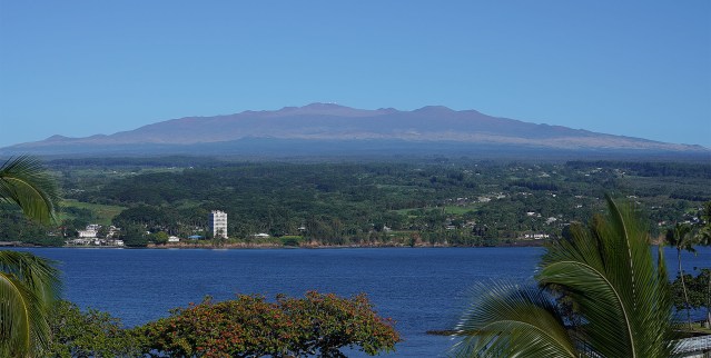 Hilo Bay with the majestic view of Mauna Kea with tiny dots on the summit, the observatories.