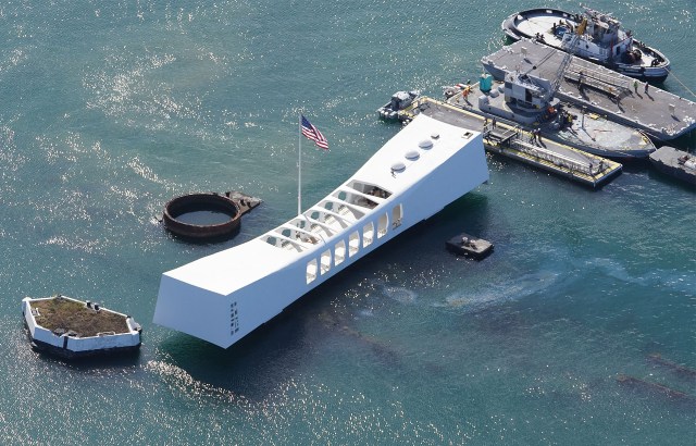 Joint Base Pearl Harbor Hickam USS Arizona Memorial with oil slick.