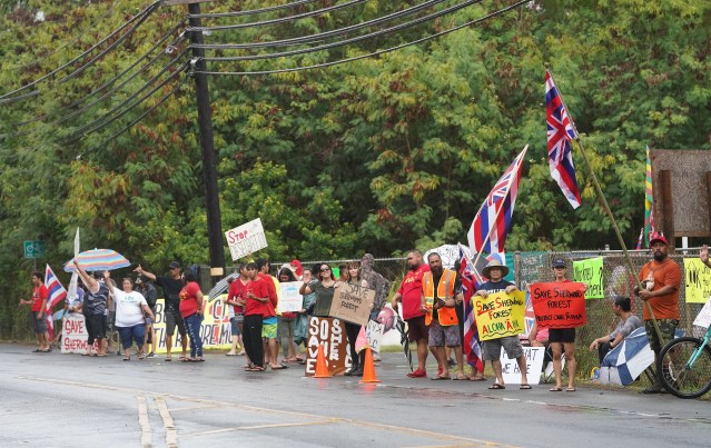 Save Sherwood Forest supporters demonstrate along Kamehameha Highway in Waimanalo.