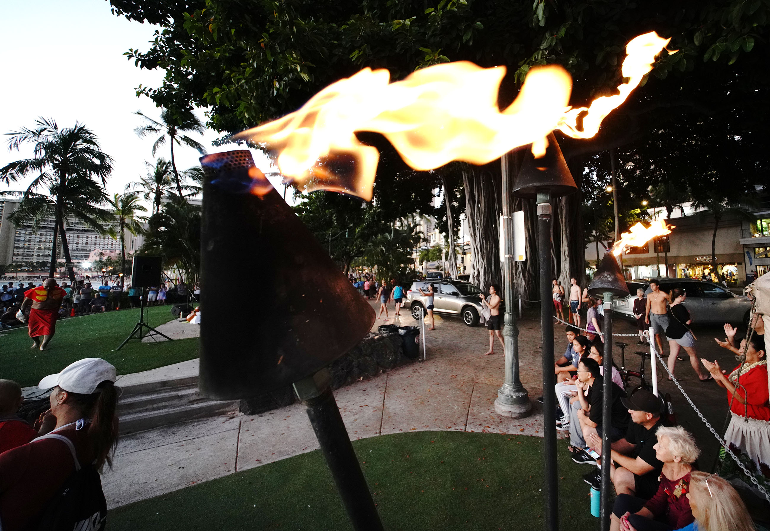 Gas Torches lit up near the Kuhio Beach Park hula mound.