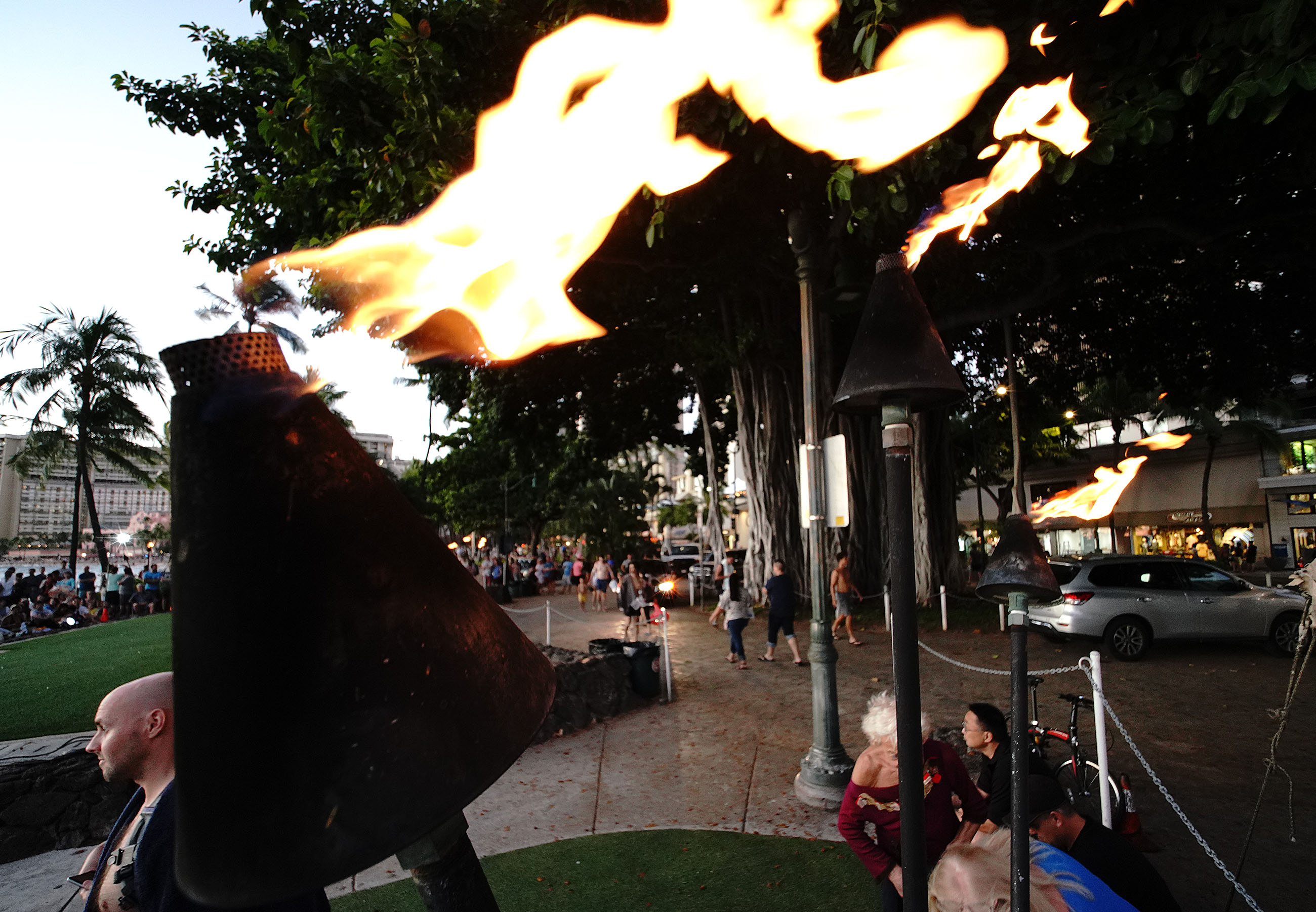 Gas Torches lit up near the Kuhio Beach Park hula mound.