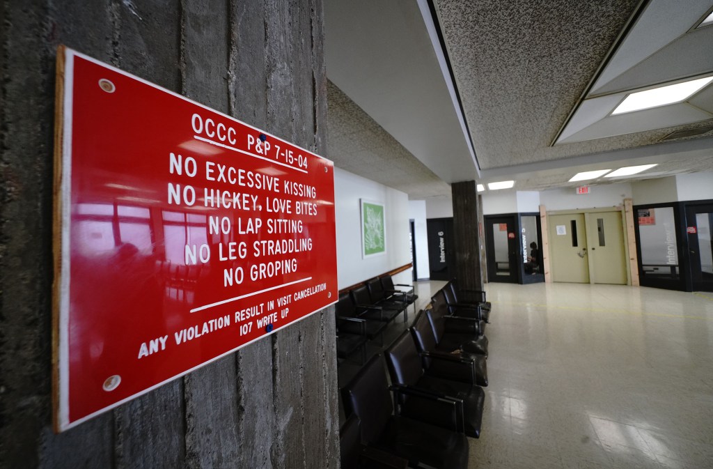 Oahu Community Correctional Center visiting area sign no excessive kissing and non hiki.