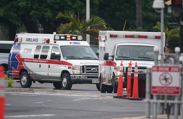Pearl Harbor shooting Nimitz Gate ambulances leave the base with sirens.