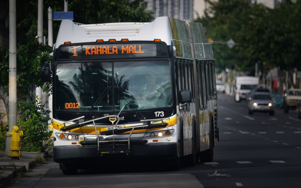 The Bus Number 1 Kahala Mall bus rolls along South King Street.